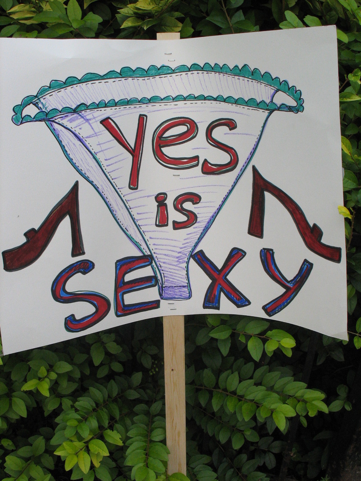 File Photo of a sign saying "Yes is sexy" at Take Back The Night 2012: Karen Nickel/The Dialog