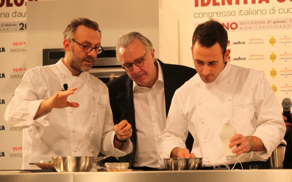 Chef Alain Ducasse (middle) working with two chefs Photo: Alain Ducasse by Leoboudv/Wikimedia Commons. CC SA 2.0