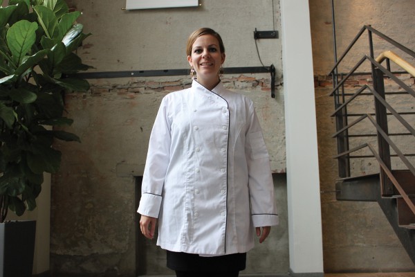 Cheryl Switzer models the chef jacket for women design that will be available in September 2015. Photo courtesy of George Brown College.