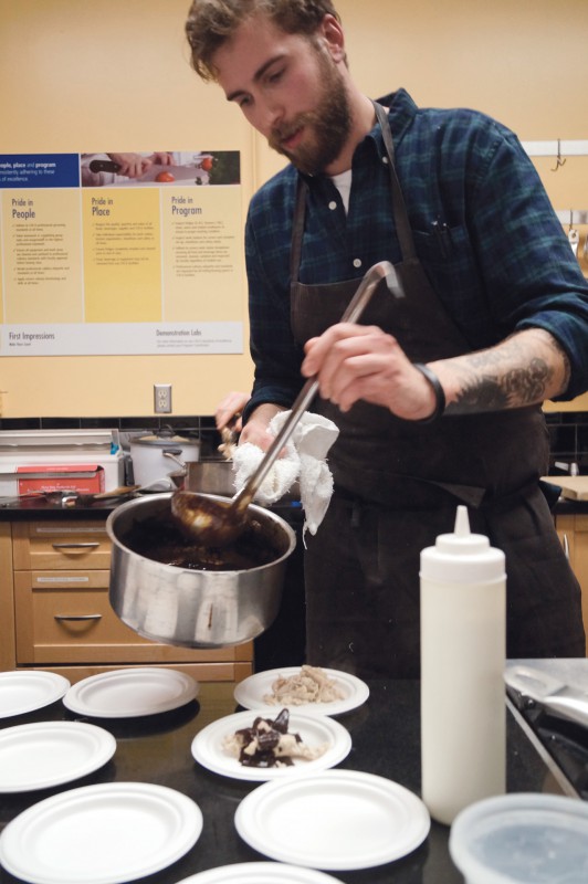 Chef Colin Tooke shares his method for making Mexican Black Mole. Photo: Deepti Batra/The Dialog