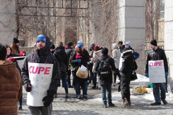 Striking TA's picketing the entrance to the University of Toronto. Photo: The Eyeopener