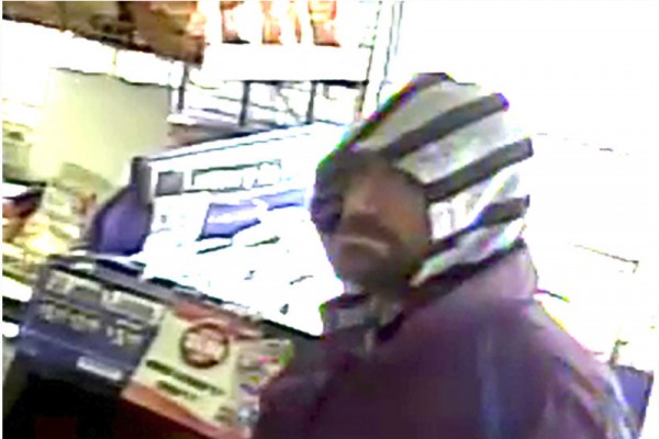 Toronto police are seeking a The man is described as white, 34-45, with a moustache and beard, and walks with a limp who is wanted for attempted robberies of two convenience stores.
