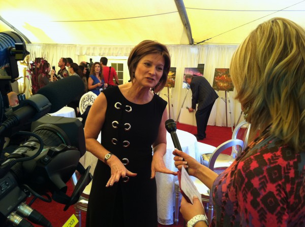 Image of Cheryl Cecchetto, Governor's ball producer, dishes to April Baker on this year's Governor's Ball WEBN-TV/CC BY-ND 2.0