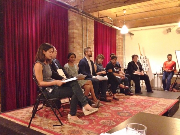 Image of people sitting on the stage in a joint discussion at Interns, Connect! event