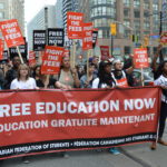 Around 2,000 students marched to Queen's Park to demand free education and action on student debt. Photo by Shuan Iyer / The Dialog