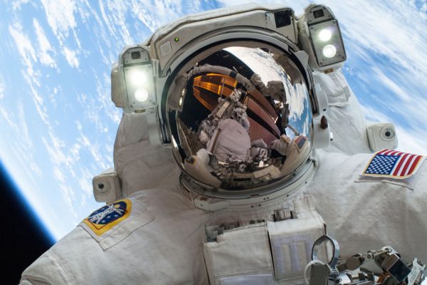 Please, please resolve to stop taking selfies this year Your selfie can't possibly top the one Astronaut Mike Hopkins took while on a spacewalk outside the International Space Station on Dec. 24, 2013. Photo: NASA