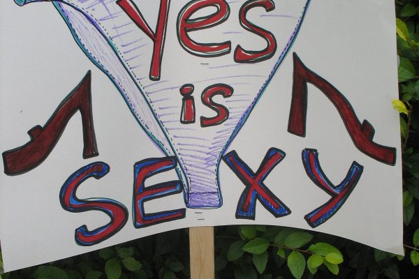 File Photo of a sign saying "Yes is sexy" at Take Back The Night 2012: Karen Nickel/The Dialog