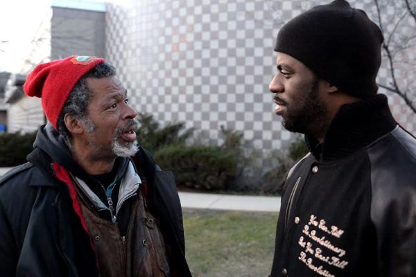 Rapper Che "Rhymefest" Smith (right) with his father Brian Tillman
