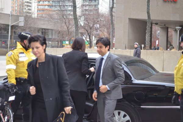 Ghomeshi does not represent the BDSM community: Cameron Jian Ghomeshi arrives at court with his lawyer on Feb. 5. Photo: Aidan Cox / The Ryersonian