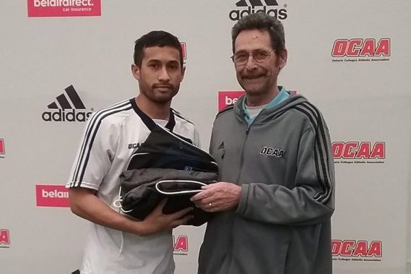 Jess Oliver accepts his OCAA all-star recognition