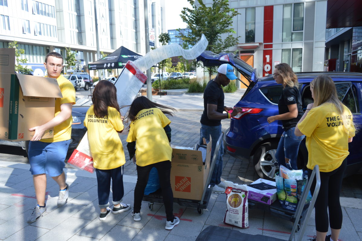 Students line-up to move into George Brown's first residence, The George