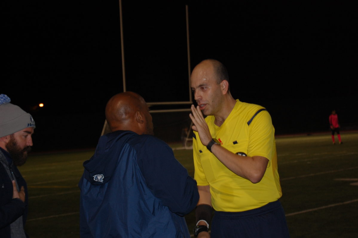 George Brown Huskies head coach John Williams argues with the referee