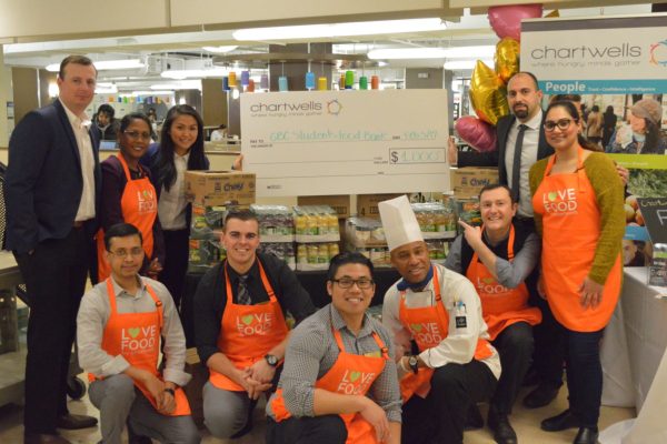 Chartwells donates $1,000 in non-perishables student Food Bank