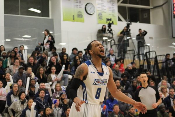 OCAA gold just out of Huskies reach Kevon Mascoe misses a three-point shot in the gold medal game against Sheridan on March 4. Sheridan won 76-74 in the final seconds. Photo: Philip Iver / The Dialog