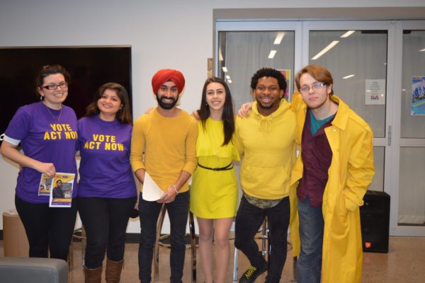 Act Now and V3 candidates pose for a picture at the end of the Casa Loma debates. Photo by Indira Ordaz / The Dialog