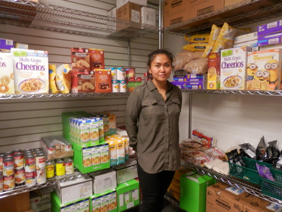 Ronnie Cruz, Community Services Coordinator at the Student Association, showed us the donations received at GBC's food bank. Photo: Natalia Pizarro Silva/The Dialog