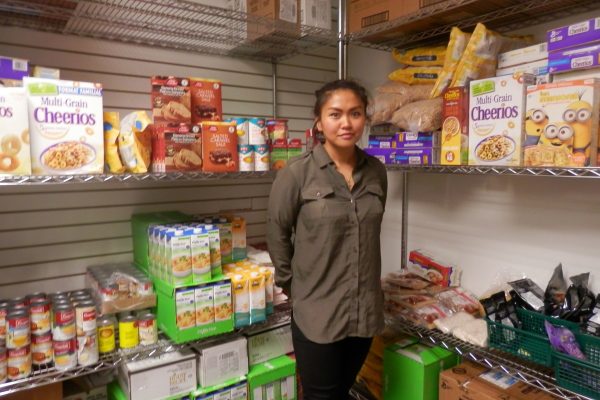 Ronnie Cruz, Community Services Coordinator at the Student Association, showed us the donations received at GBC's food bank. Photo: Natalia Pizarro Silva/The Dialog