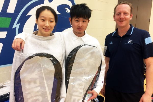 Huskies ace latest badminton tournament