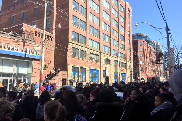 A report of a dangerous package at George Brown College's main St. James campus at 200 King St. East forced hundreds of students outside as police swept the building before declaring it safe. Photo: Natasha Burtenshaw-deVries