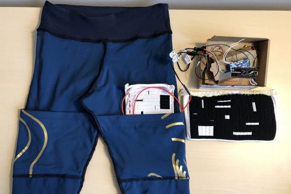 Team Delirium's therapeutic garment prototype wins award at hackathon competition. Photo: Luis Matute