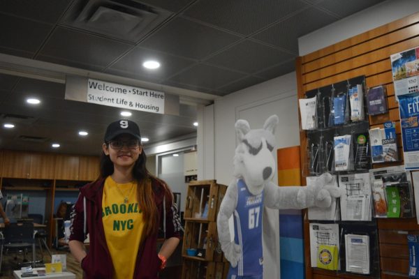 GBC students share their housing tips Sara Do stands in front of a sign saying "student life and housing" at George Brown College.